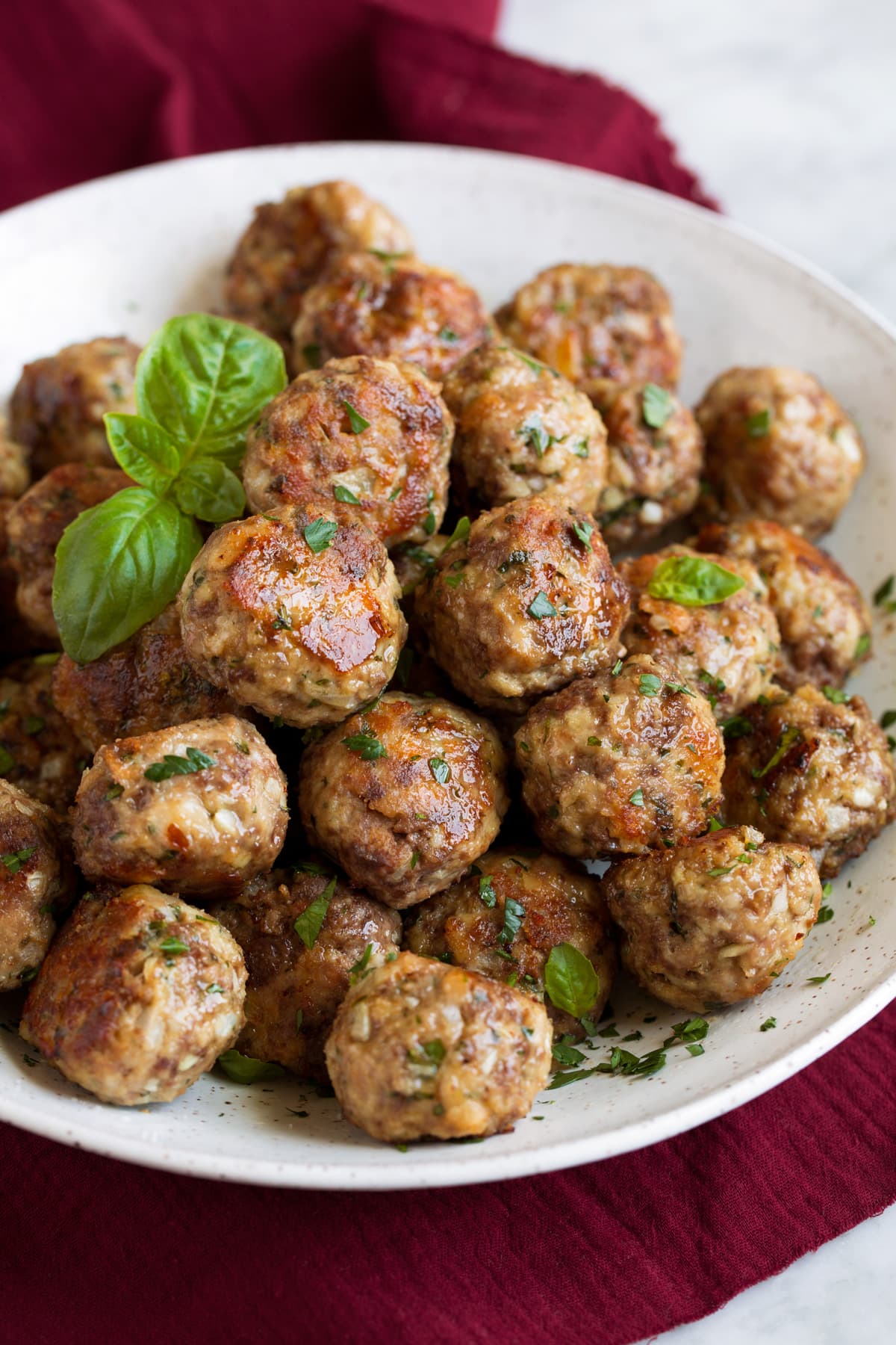 BEST MEATBALLS - these are so flavorful, so tender and packed with fresh ingredients! Makes the best spaghetti and meatballs ever! #meatballs #spaghetti #italian #dinner #groundbeef #pork #recipe Meatball recipe