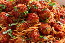 Bowl full of spaghetti and meatballs.