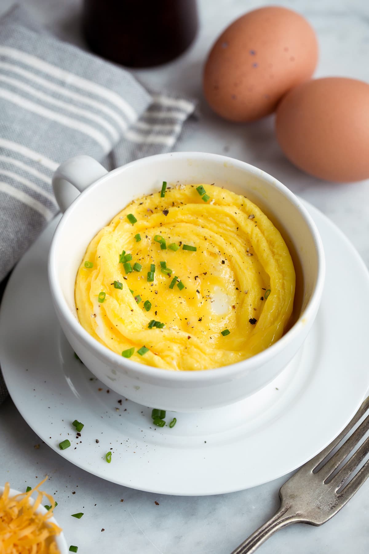 Microwave Scrambled Eggs in a Mug - super fast, super easy and always delicious! Perfect for breakfast sandwiches too! #eggs #breakfast #easybreakfast #quickbreakfast Microwave Eggs in a Mug