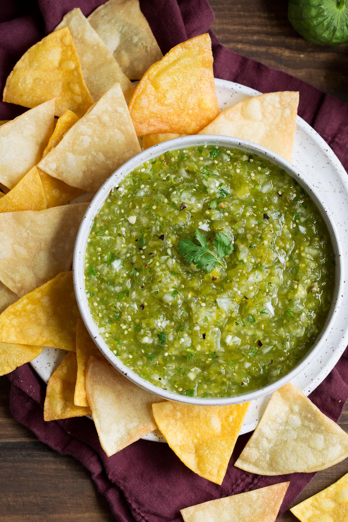 Salsa Verde Salsa Verde in a bowl with a side of tortilla chips.