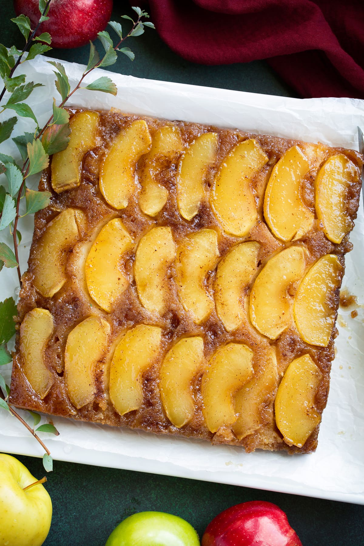 Apple Upside Down Cake Apple upside down cake with rows of apple slices shown on top.
