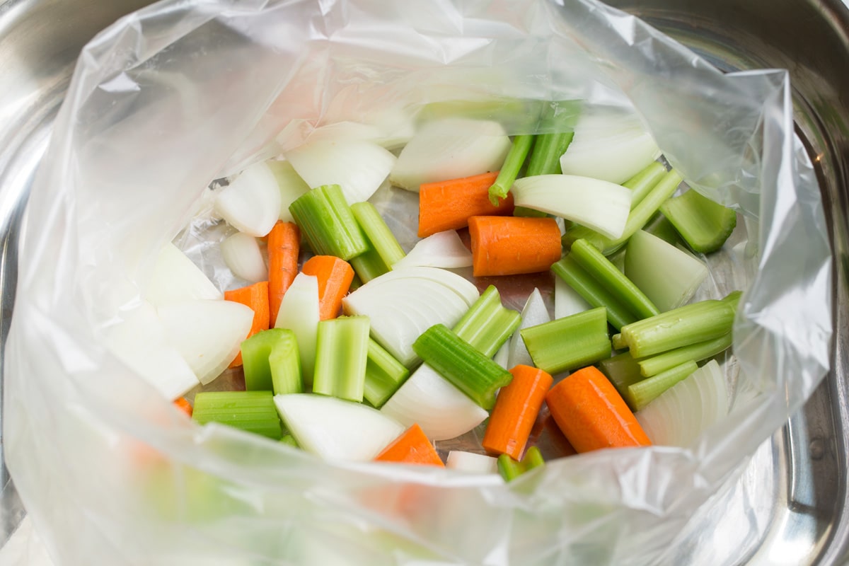 How to Cook Turkey in an Oven Bag Chopped onion, celery and carrots in a roasting bag.