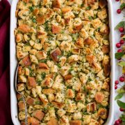 Stuffing in a white casserole dish.