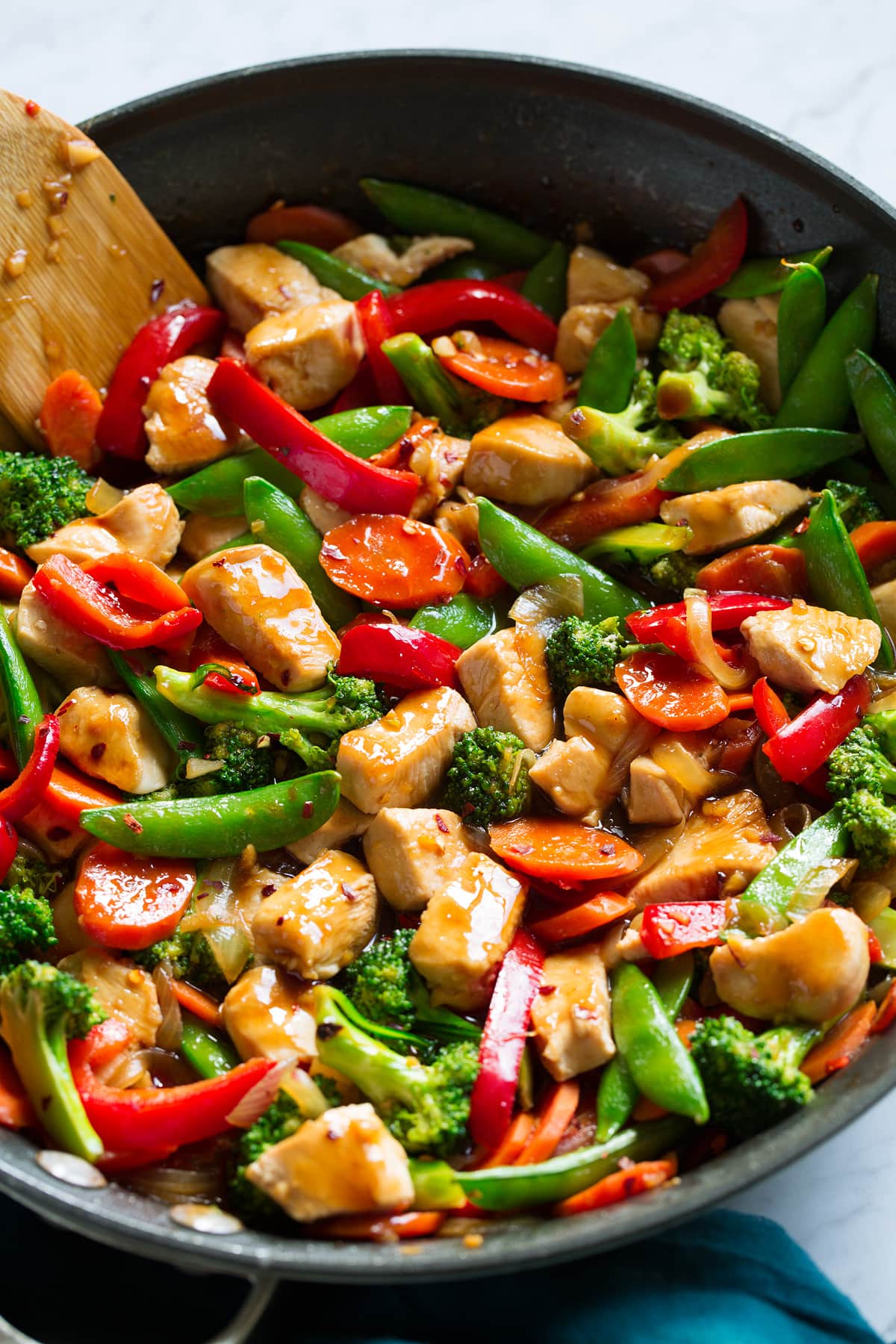 Chicken Stir Fry Close up image of chicken and vegetable stir fry in a skillet.