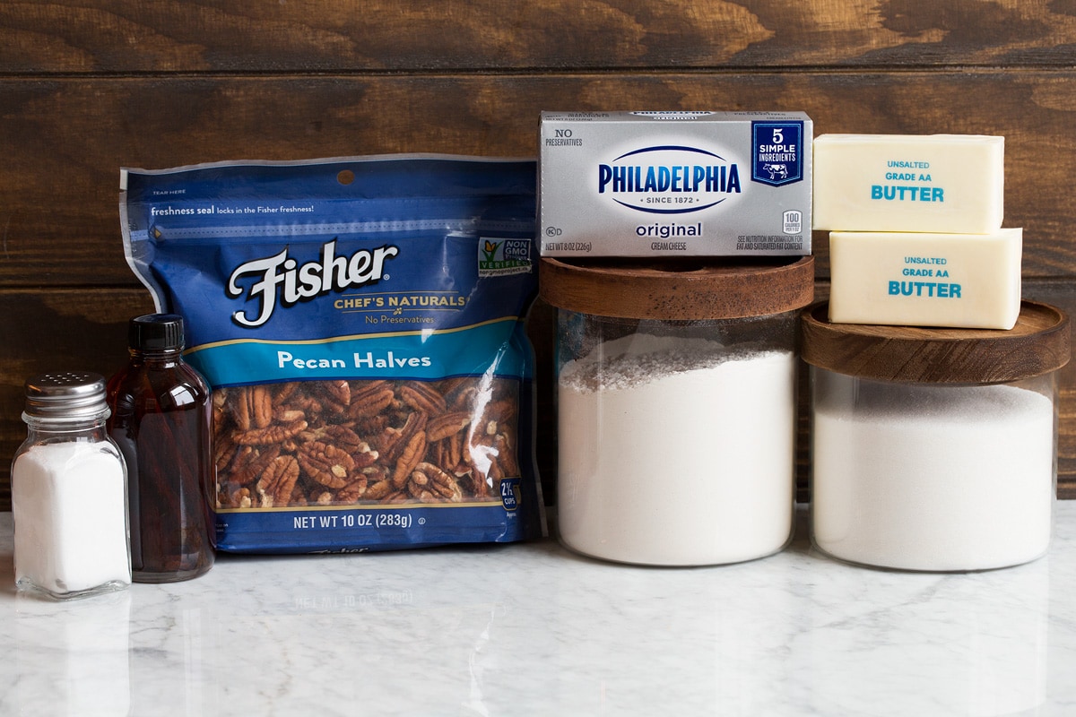 Cream Cheese Pecan Cookies Image showing ingredients that go into cream cheese pecan cookies.