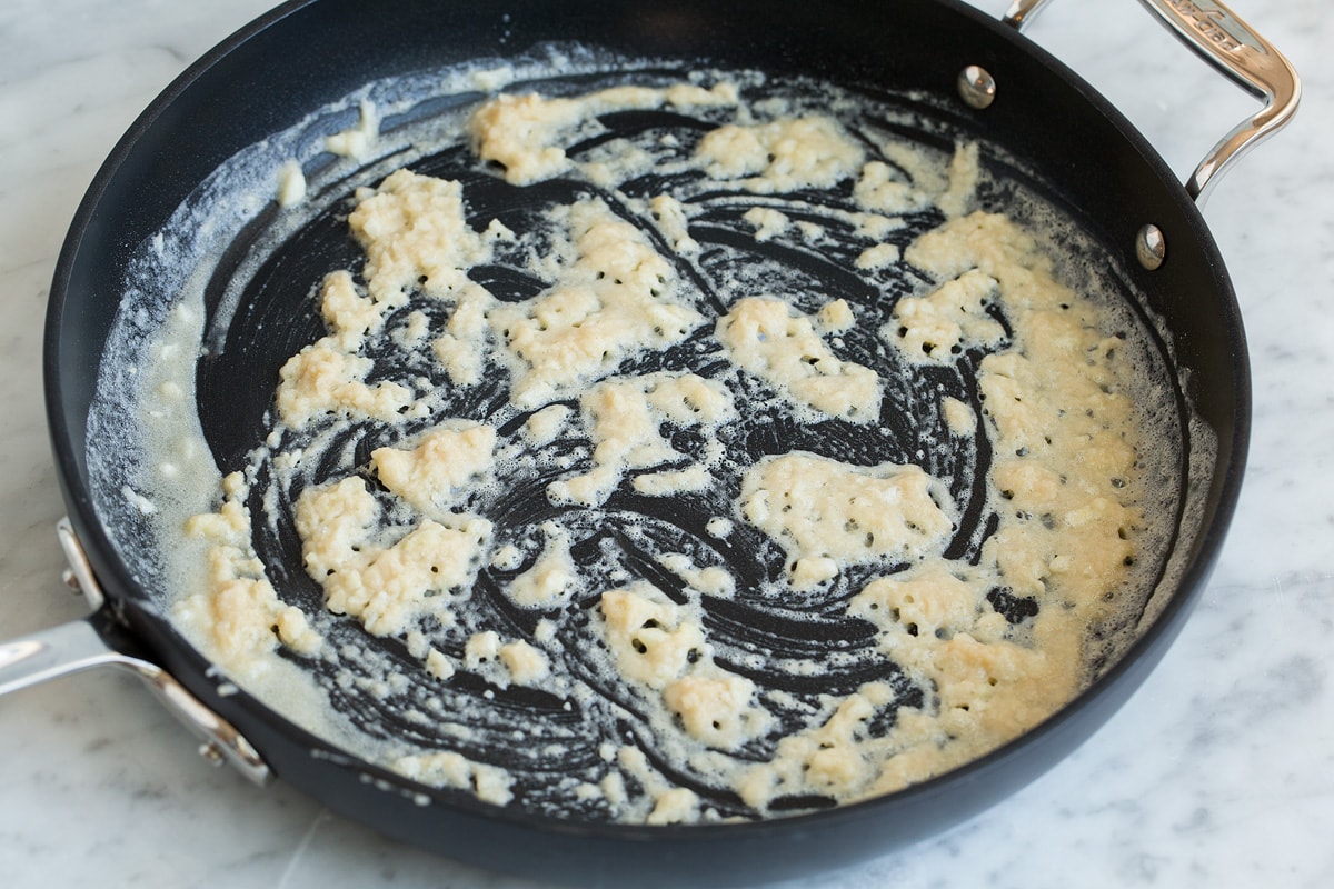 Creamy Spinach Tomato Tortellini Making a roux in a skillet.