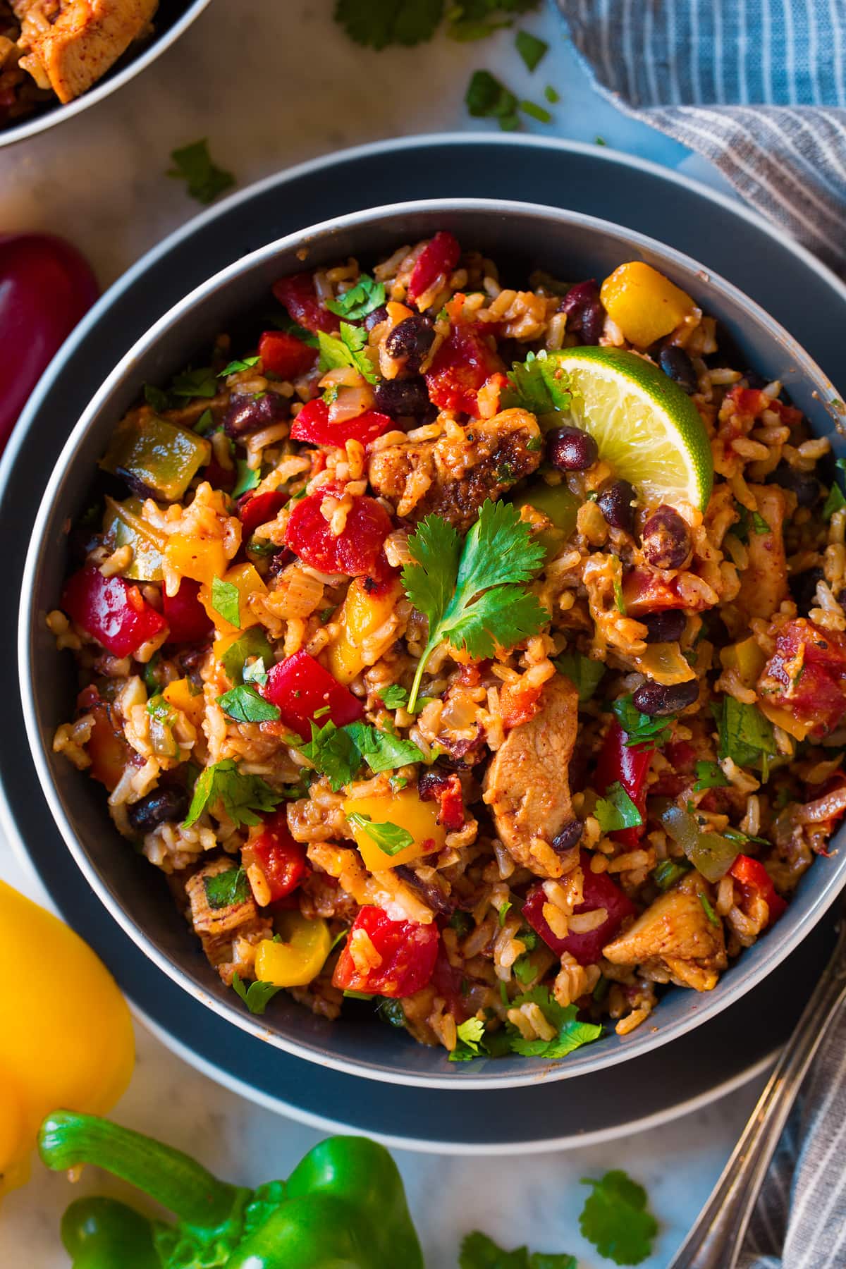 Chicken Fajita Rice Bowls Overhead image of easy chicken black bean bell pepper rice bowl.