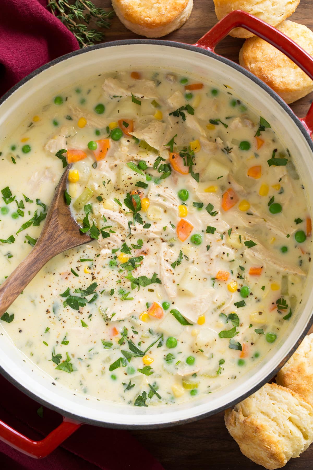Creamy Chicken Pot Pie Soup Pot full of chicken pot pie soup with ladle in the soup.