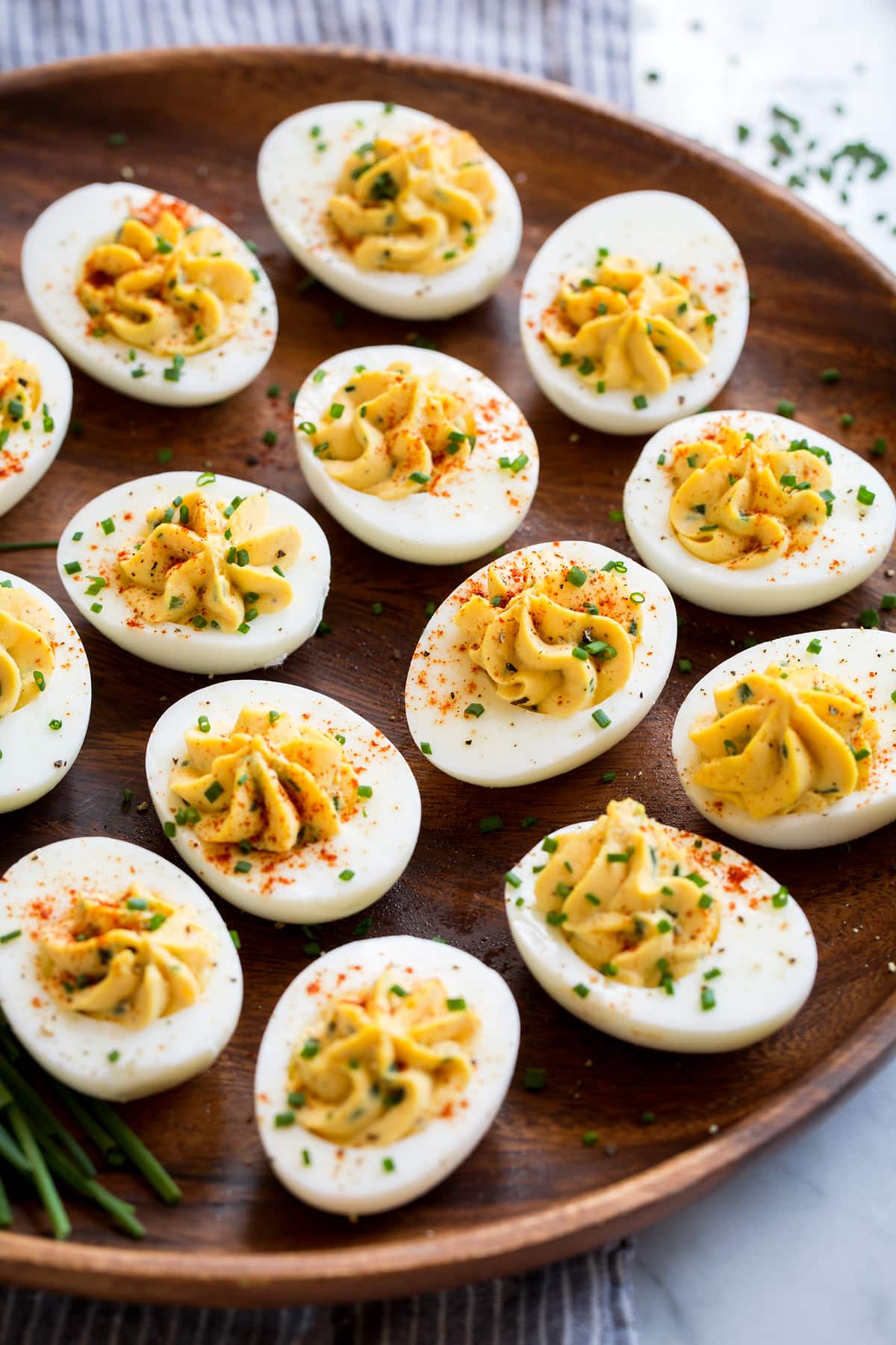 Best Deviled Eggs Plain deviled eggs on a wooden platter (no bacon).