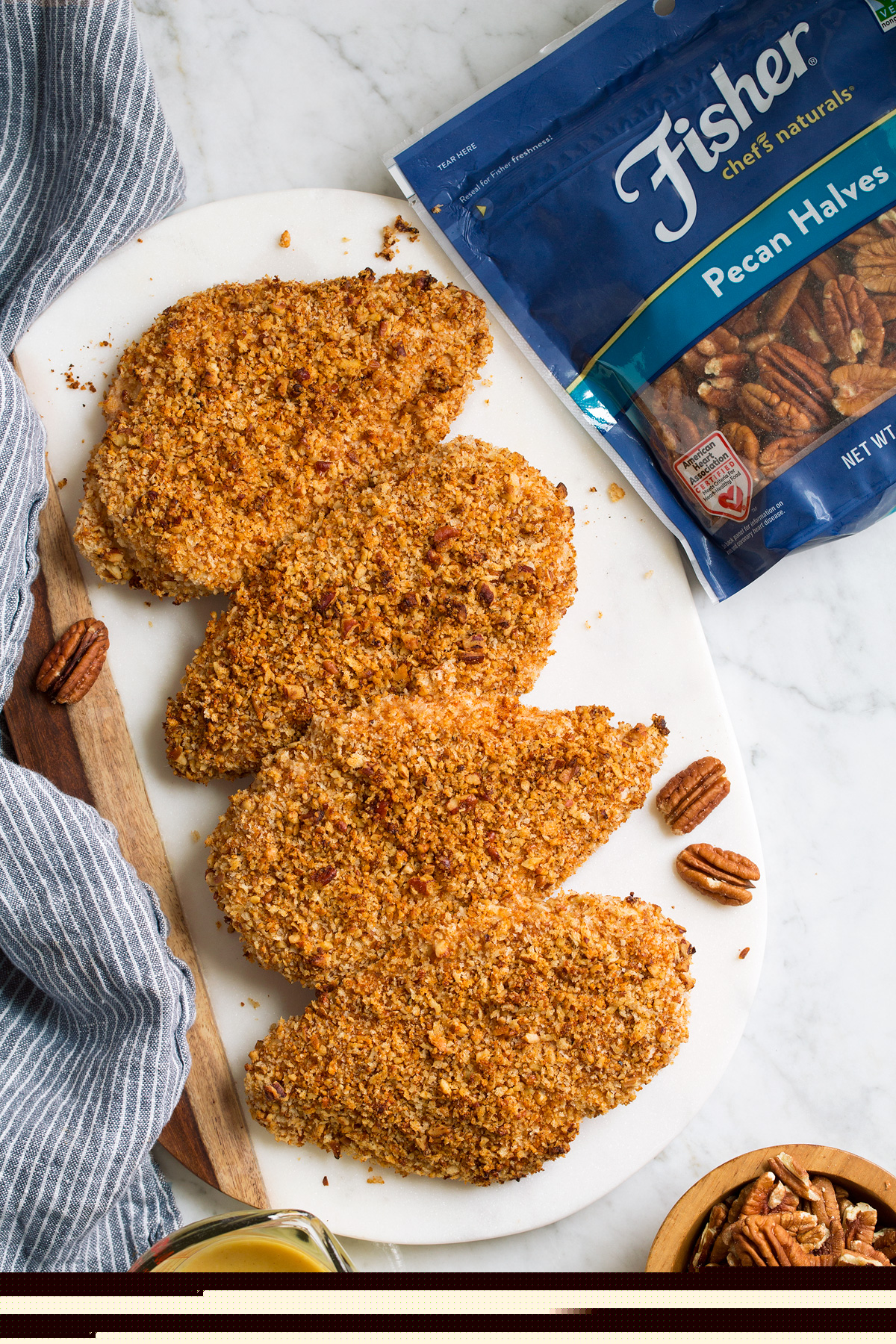 Honey Mustard Pecan Crusted Chicken Honey Mustard Pecan Crusted Chicken on a white serving platter.