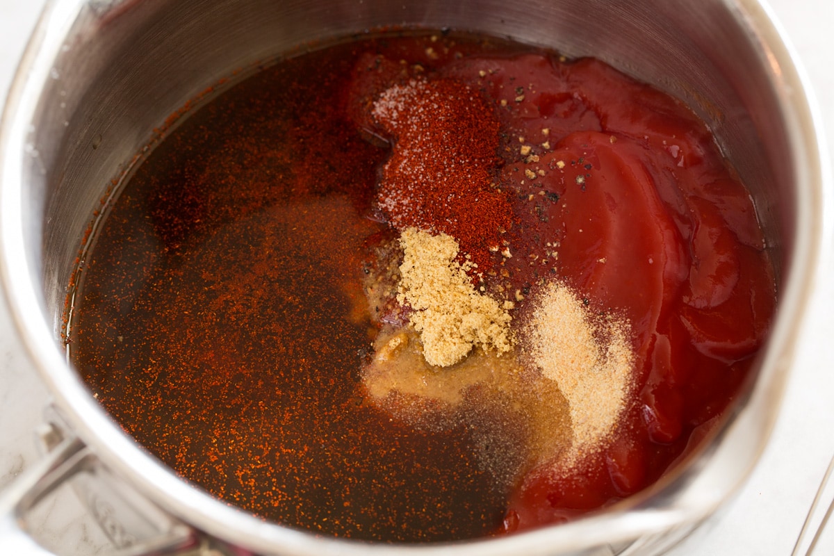 Homemade BBQ Sauce BBQ sauce ingredients in a saucepan before mixing.