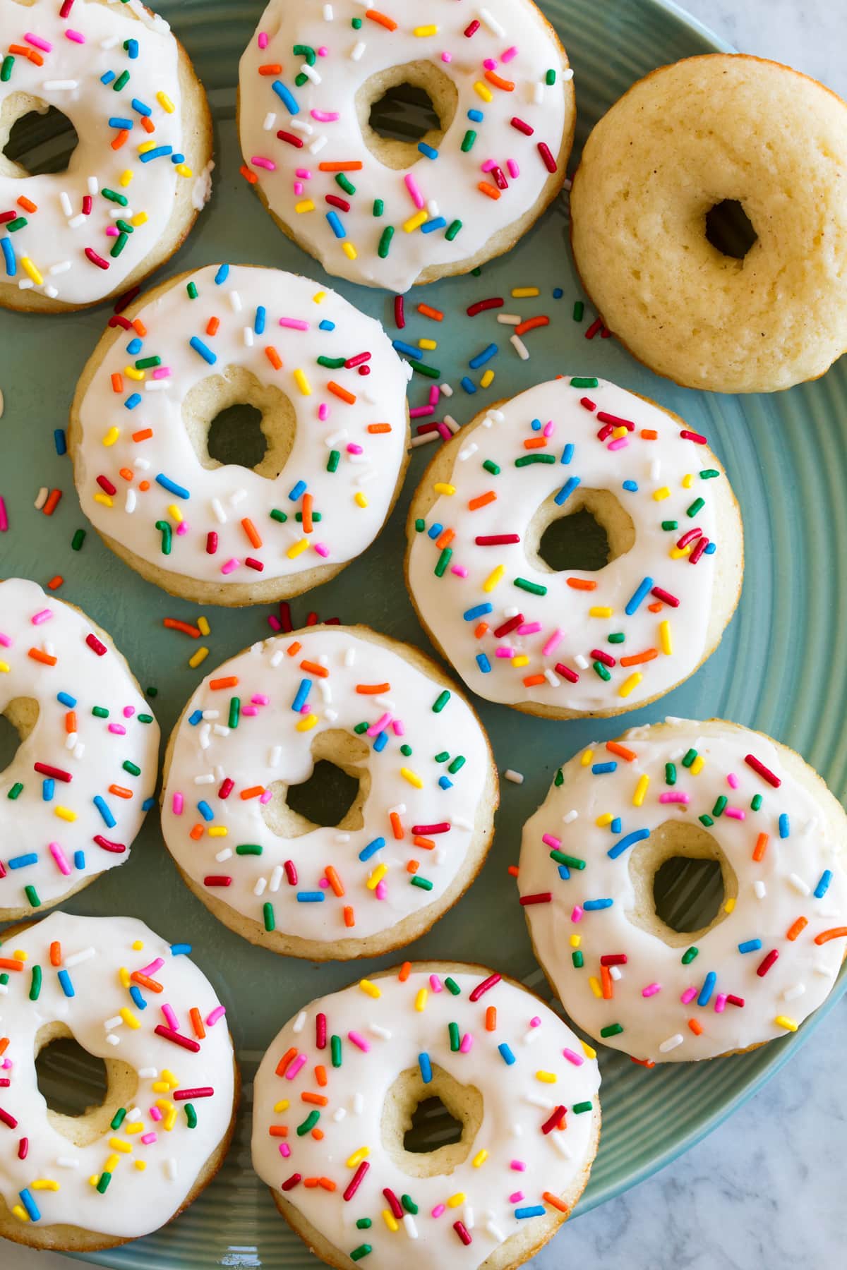 Baked Donuts Overhead photo of homemade Baked Donuts on serving platter.