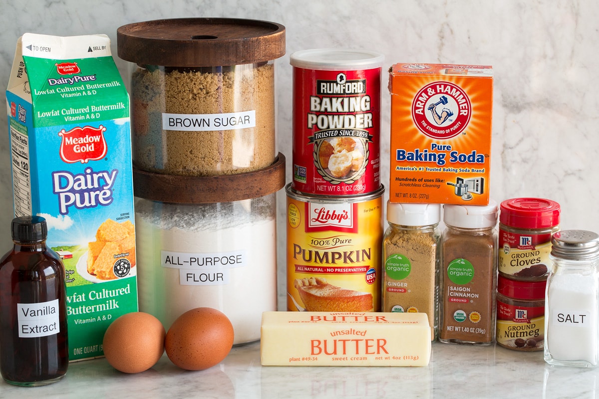 Pumpkin Pancakes Image of ingredients used to make pumpkin pancakes. Shows flour, brown sugar, salt, baking powder, baking soda, spices, butter, buttermilk, eggs and vanilla.