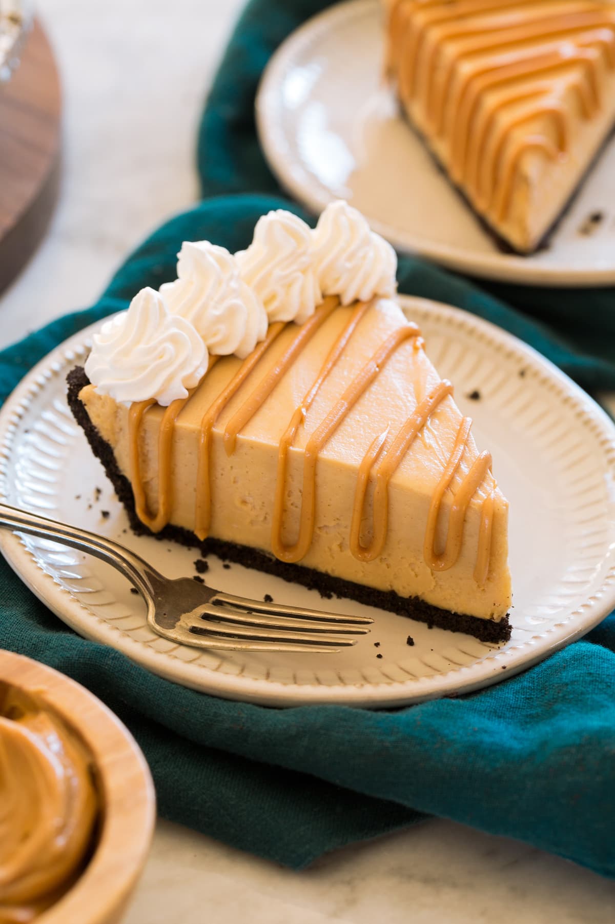 Slice of peanut butter pie on a dessert plate.
