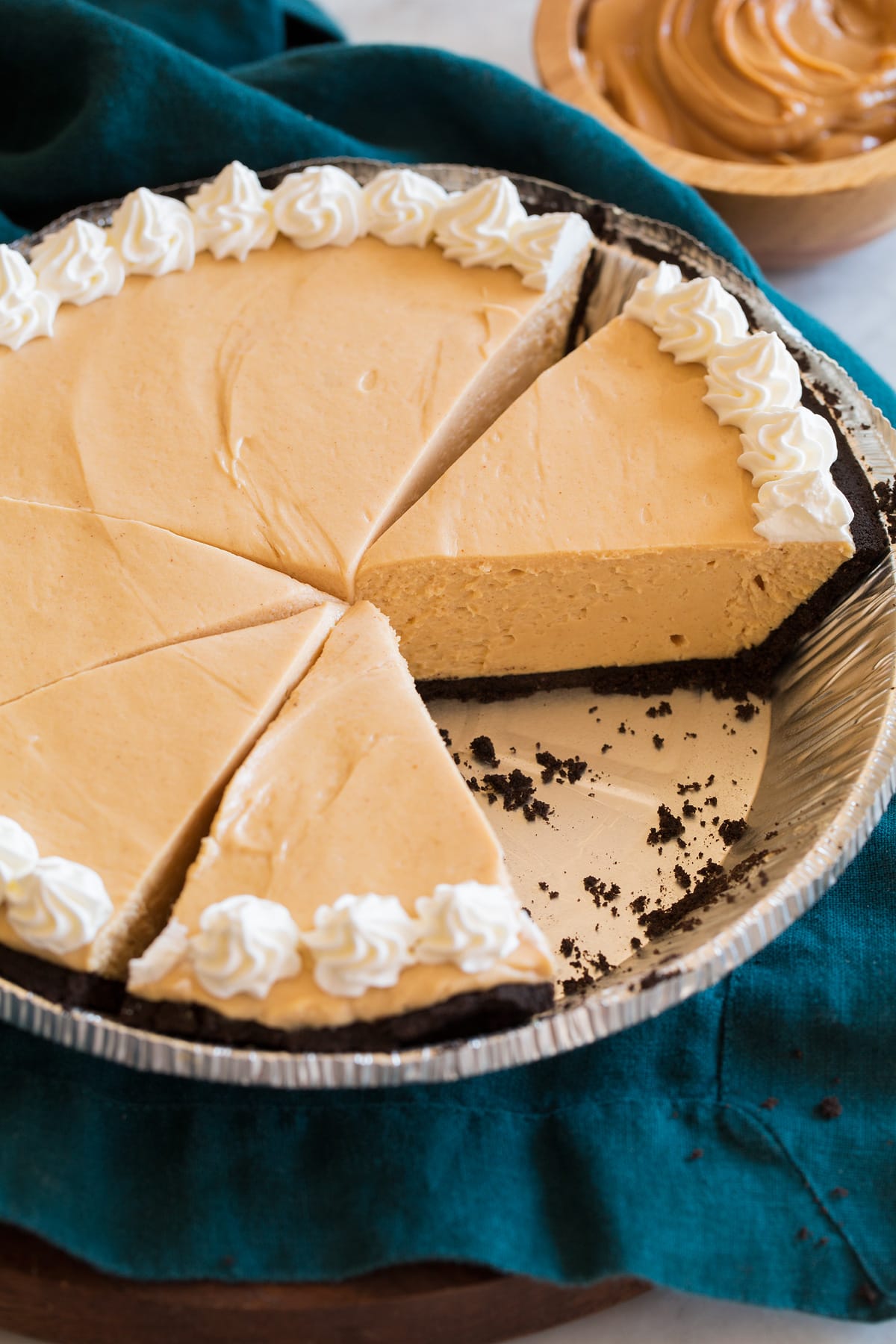 Peanut Butter Pie Peanut butter pie shown sliced in an aluminum pie dish.