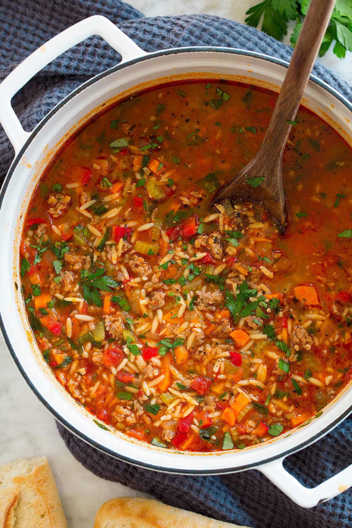 Italian Sausage Soup {with Orzo} Overhead image of Italian sausage soup in a pot.