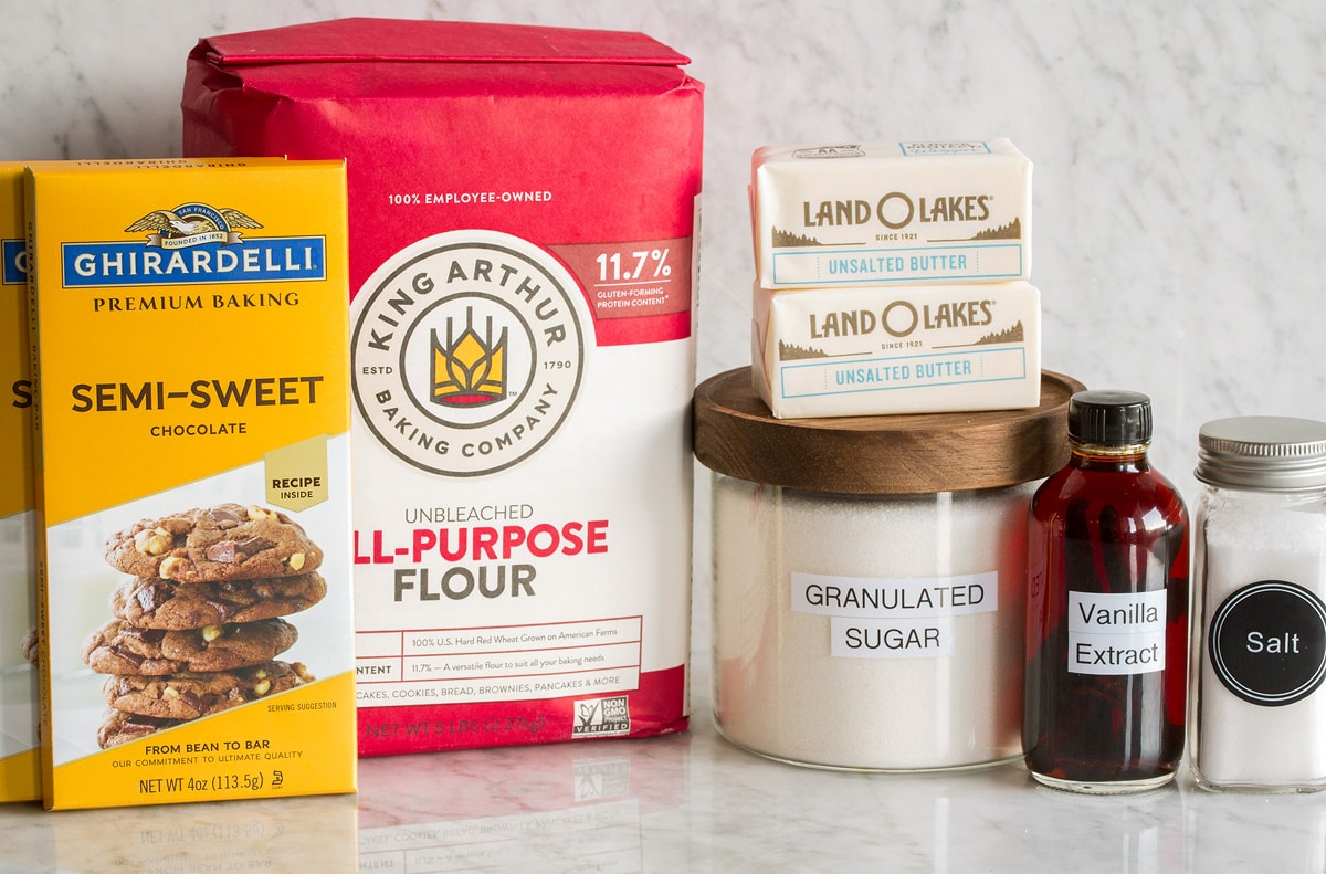 Shortbread Cookies Image of ingredients needed to make shortbread. Includes flour, butter, sugar, vanilla, salt and optional chocolate for dipping.