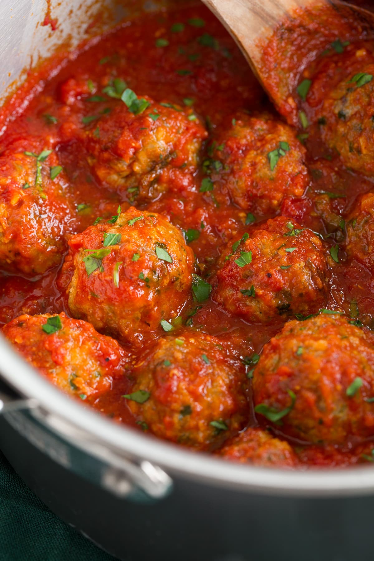 Turkey Meatballs Turkey meatballs in marinara sauce in a saucepan.
