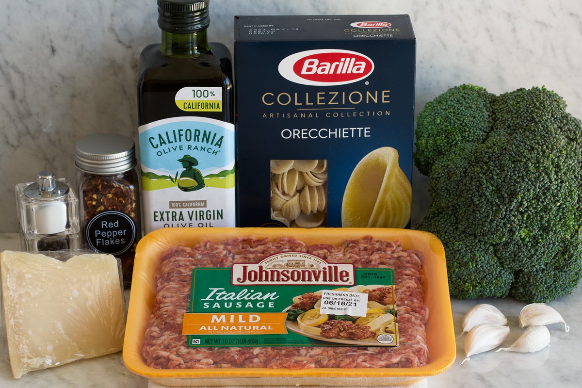 Orecchiette with Sausage and Broccoli Photo: Ingredients used to make orecchiette with sausage and broccoli shown. Includes Italian sausage, pasta, broccoli, olive oil, garlic, parmesan, red pepper flakes, salt and pepper.