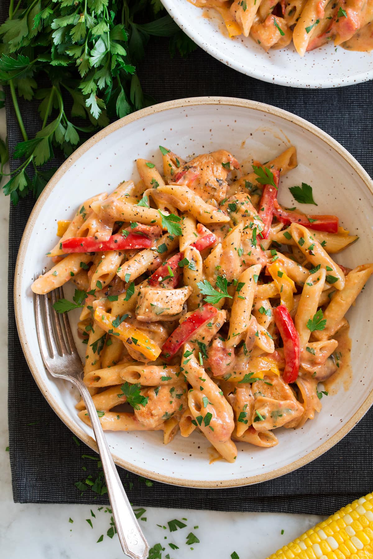 One Pot Cajun Chicken Pasta Photo: Serving of cajun chicken pasta in a bowl.
