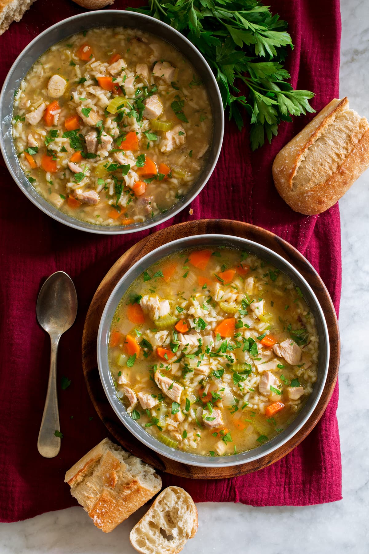 Chicken and Rice Soup Two bowls filled with chicken rice soup.