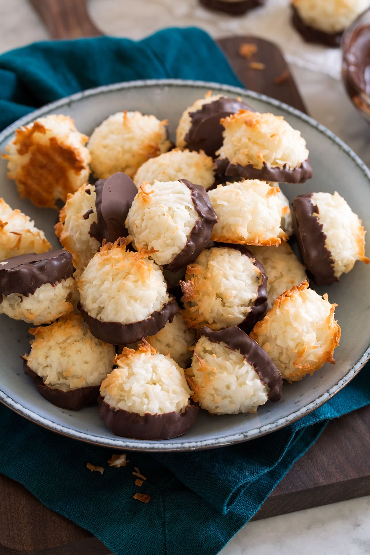 Coconut Macaroons Bowl full of chocolate dipped coconut macaroons.