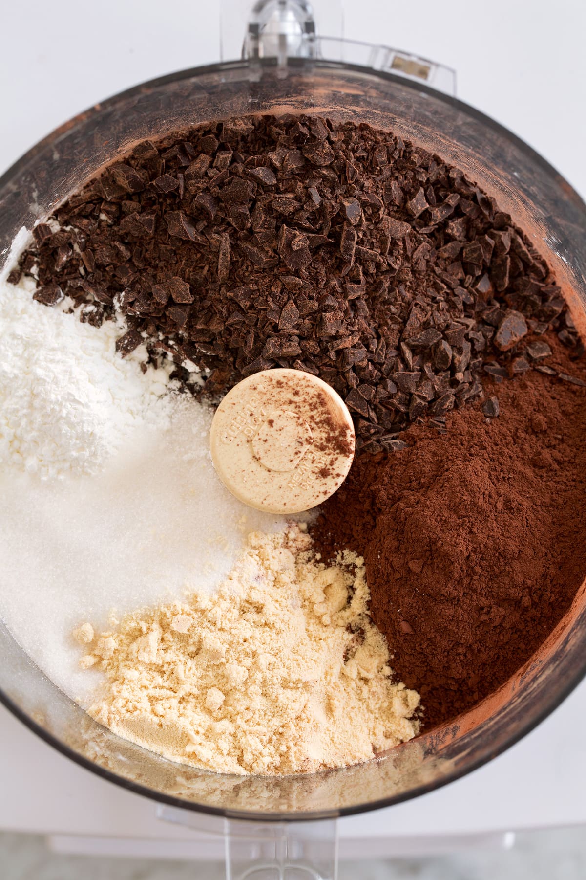 Homemade Hot Chocolate Mix Hot chocolate mix in food processor before blending.