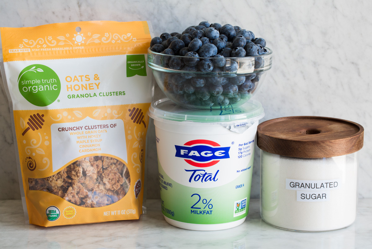 Yogurt Parfaits Ingredients needed to make a homemade yogurt parfait.