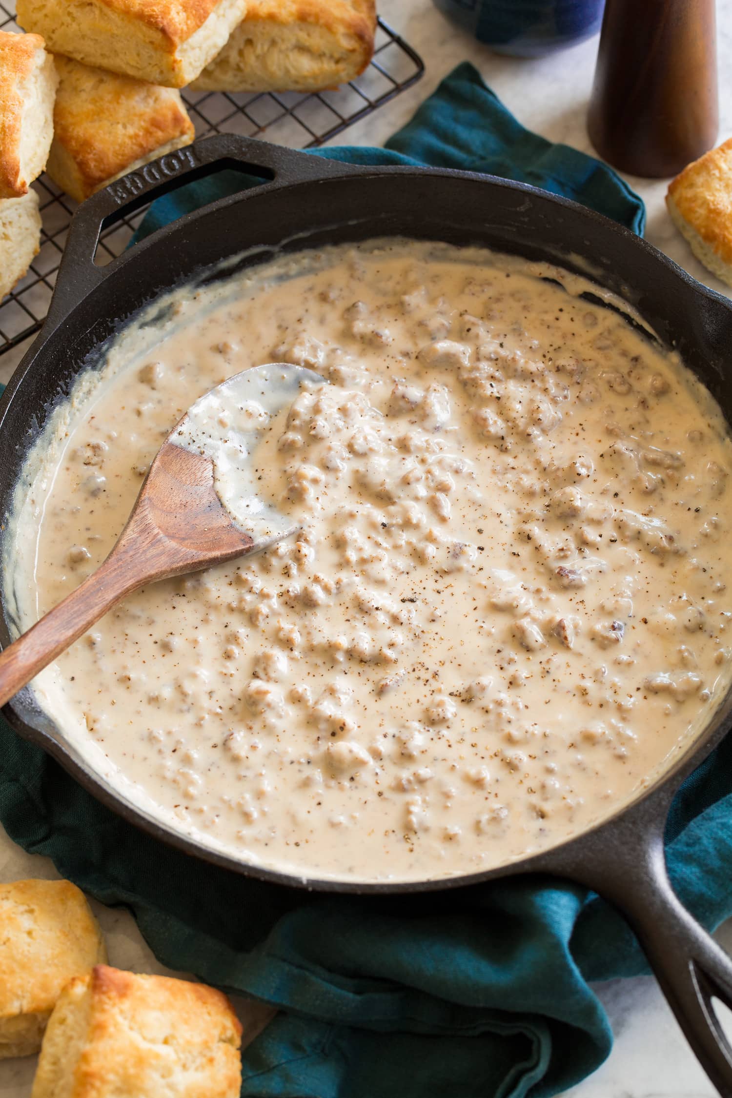 Sausage Gravy Sausage gravy in a skillet shown from a side angle in a skillet.