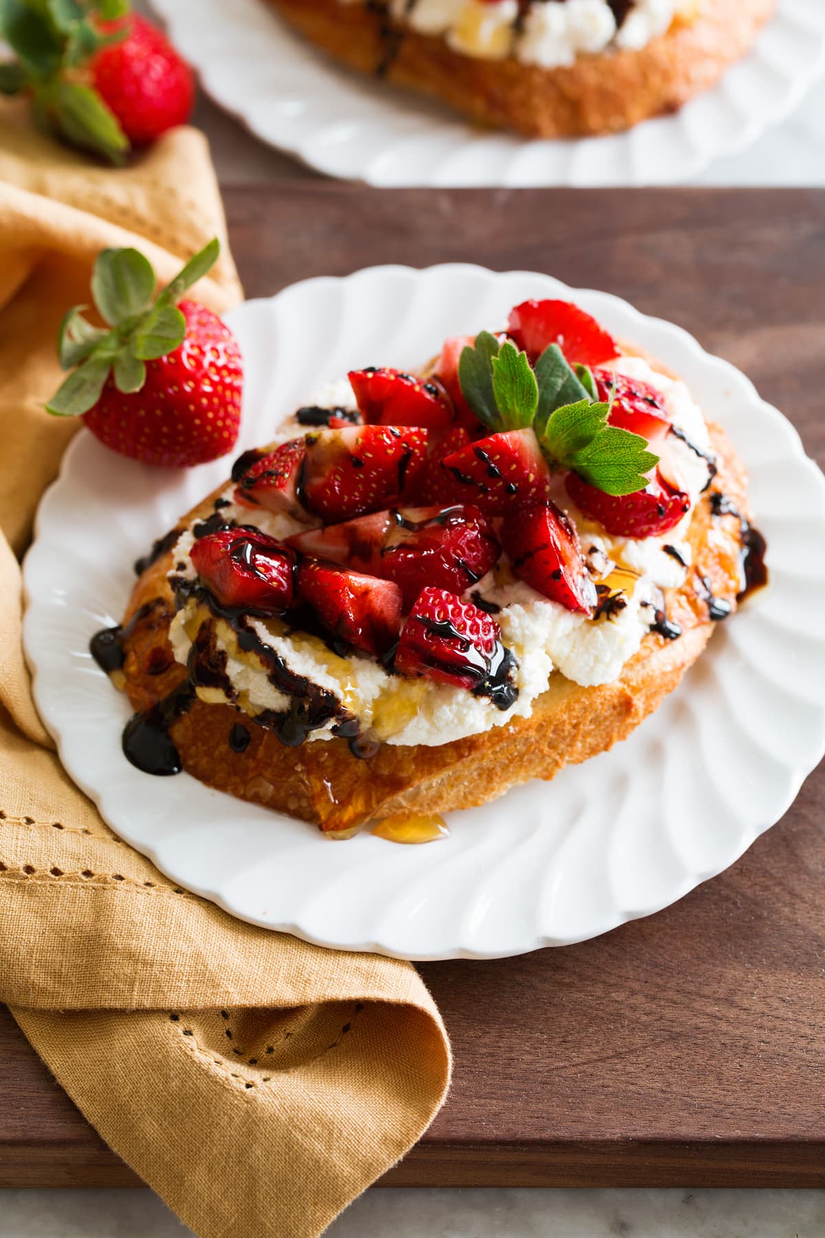 Balsamic Glaze Strawberry ricotta toast with balsamic glaze.