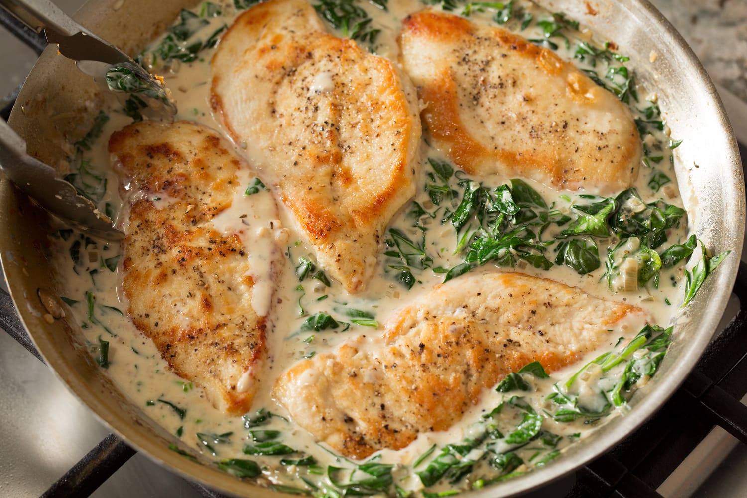 Chicken Florentine Finished chicken Florentine in skillet.