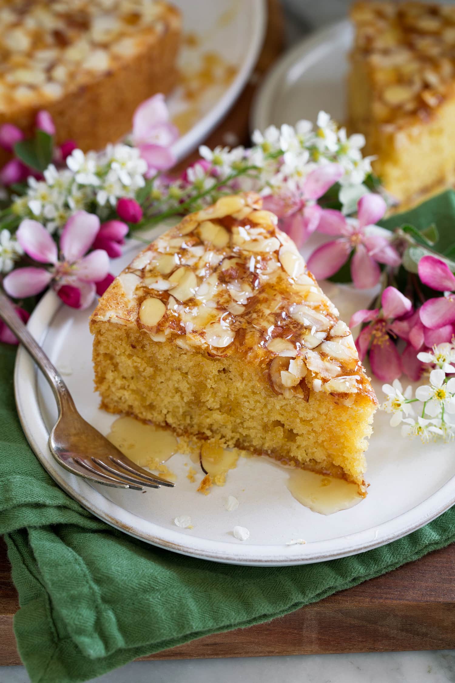 Honey Cake Honey cake with sliced almonds and honey drizzle finish.