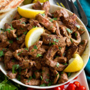 Close up photo of beef shawarma steak strips.