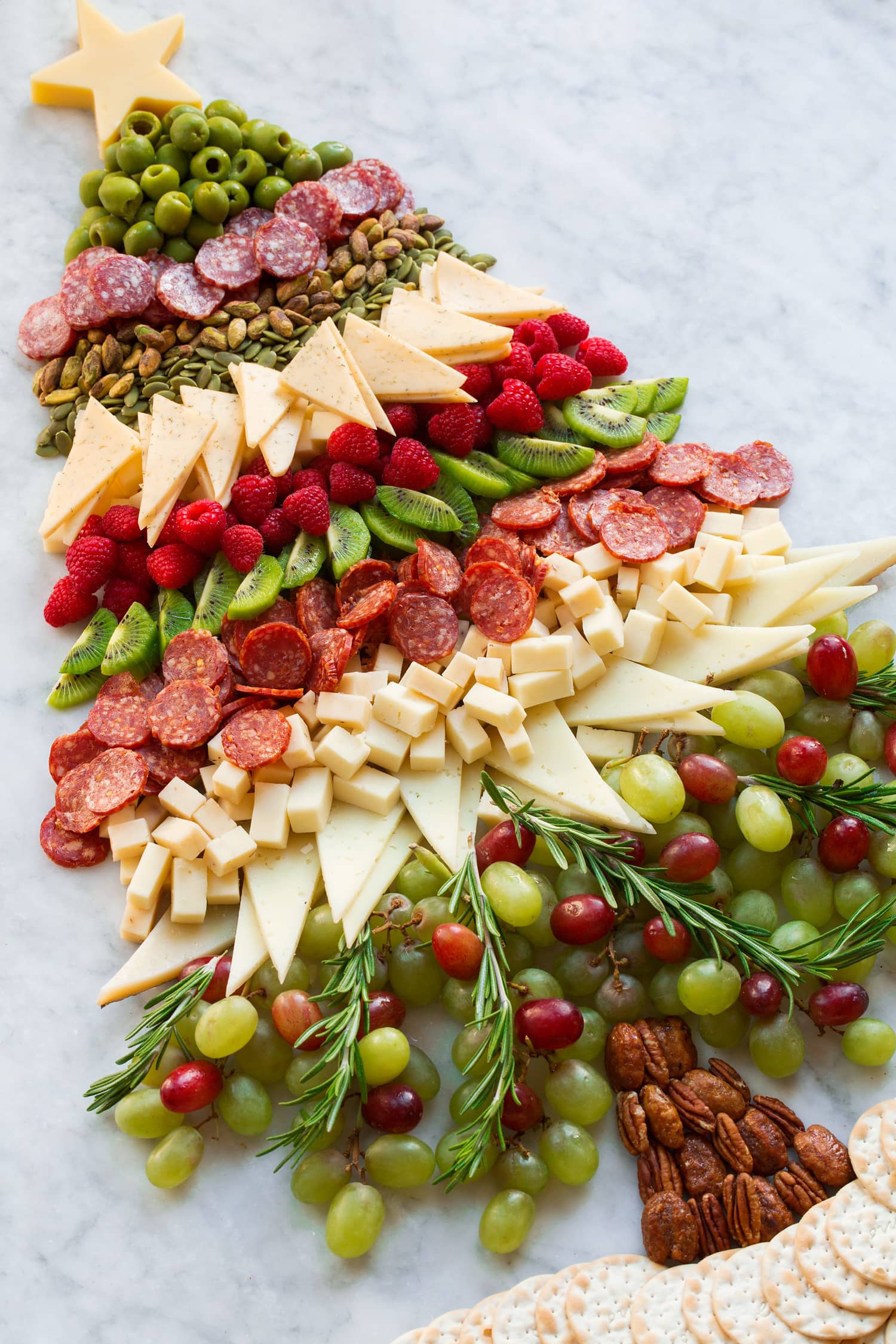 Christmas Tree Charcuterie Board Extra large Christmas tree charcuterie board shown from the side.