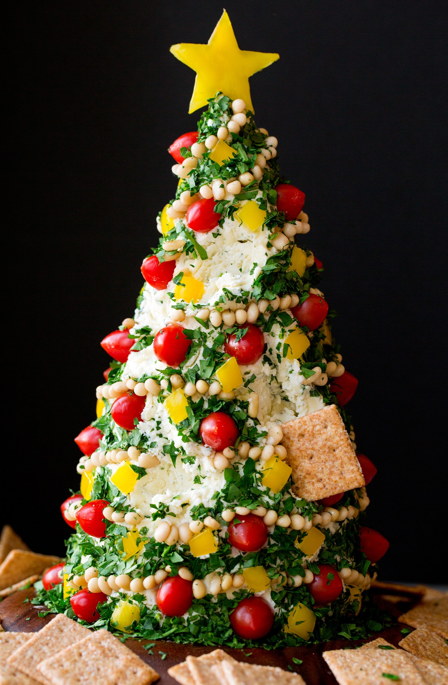 Christmas Tree Cheese Ball White cheddar cheese ball dipped into.