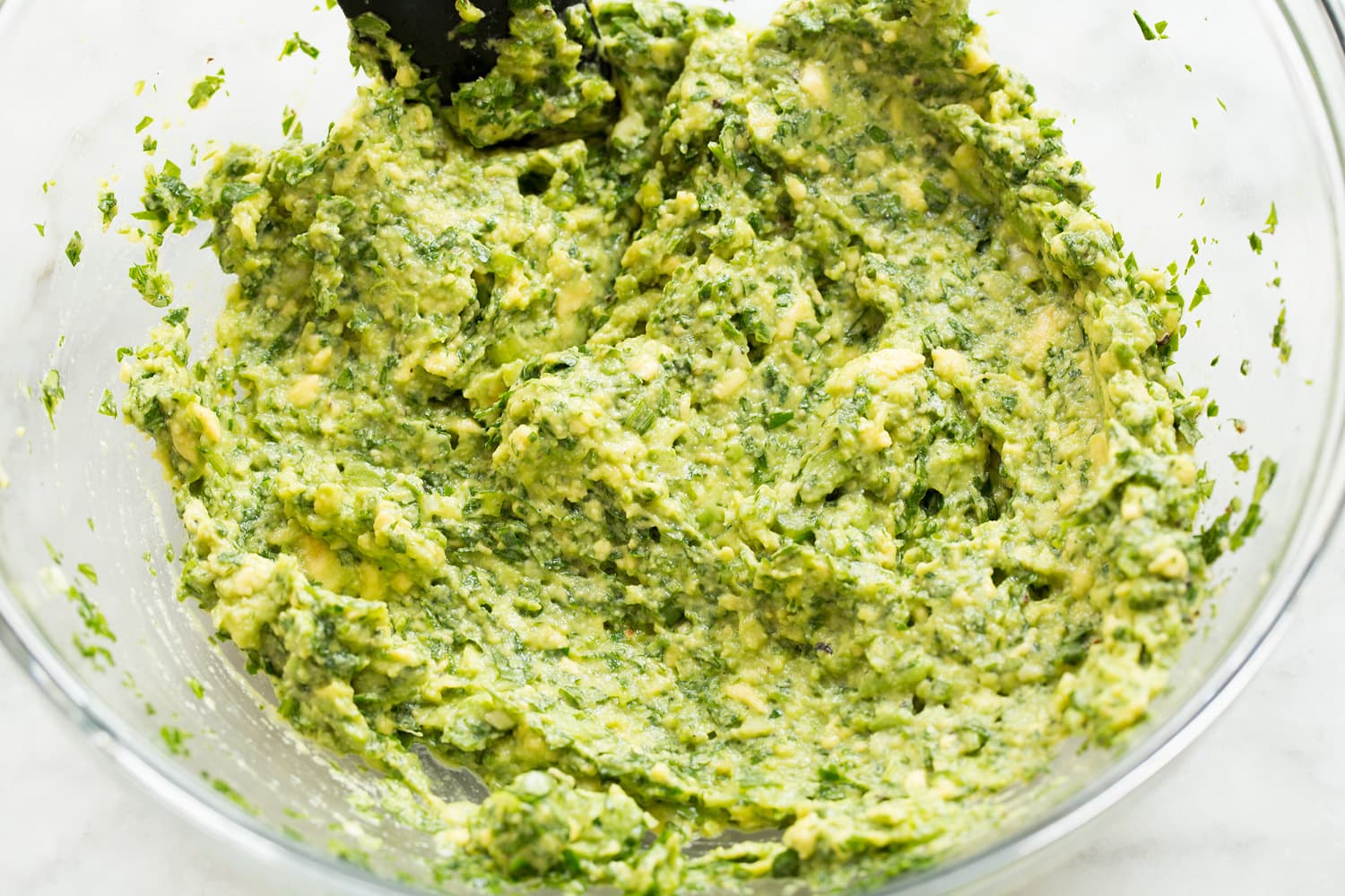 Avocado Chicken Salad Avocado mixture after stirring together in mixing bowl.