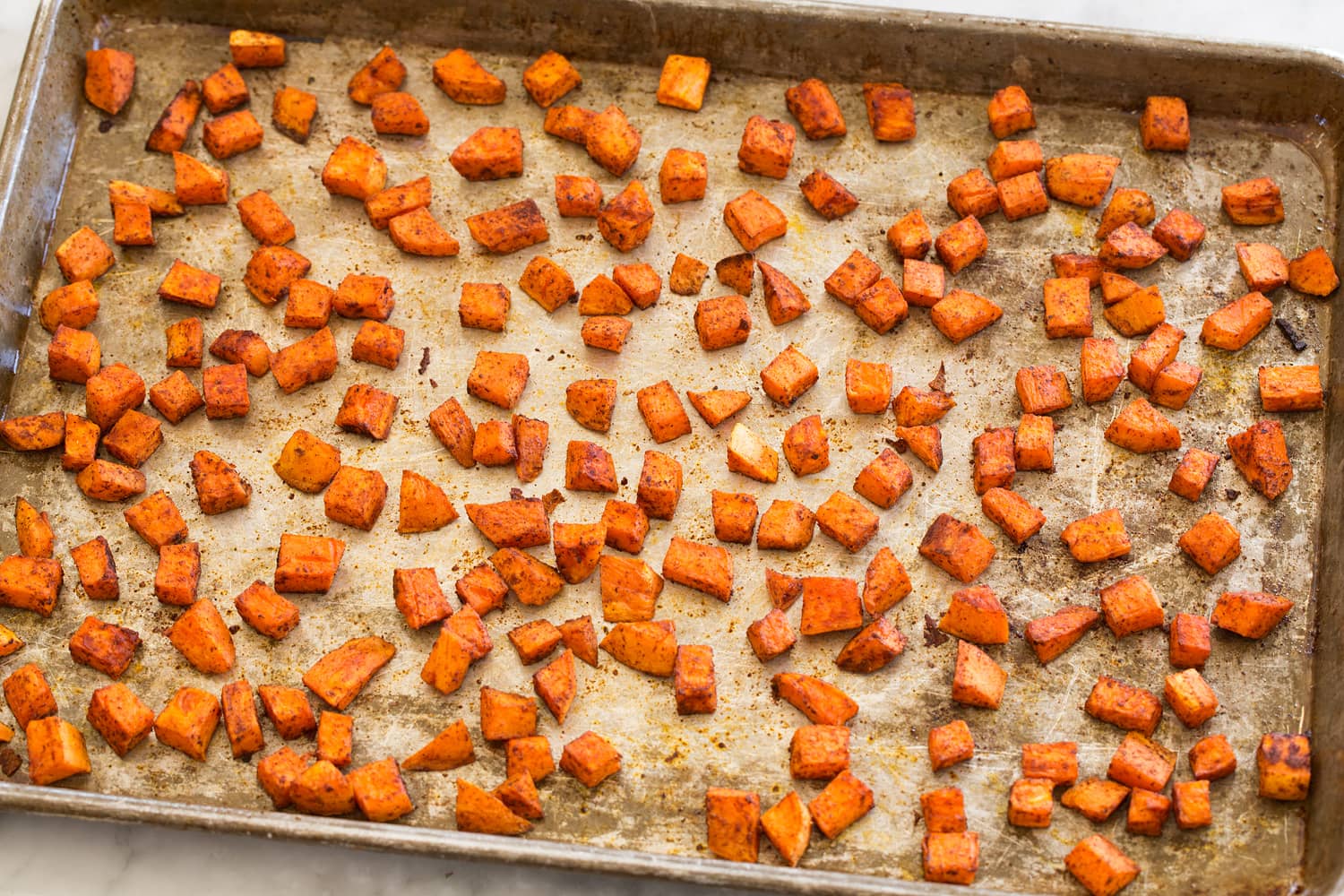 Baja Grain Bowl Roasted sweet potatoes on baking sheet.