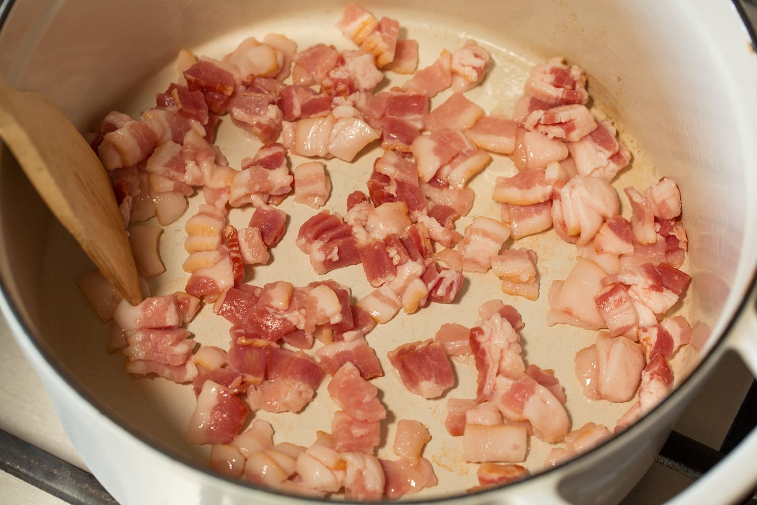 Black Bean Soup Chopped bacon in a pot before cooking.
