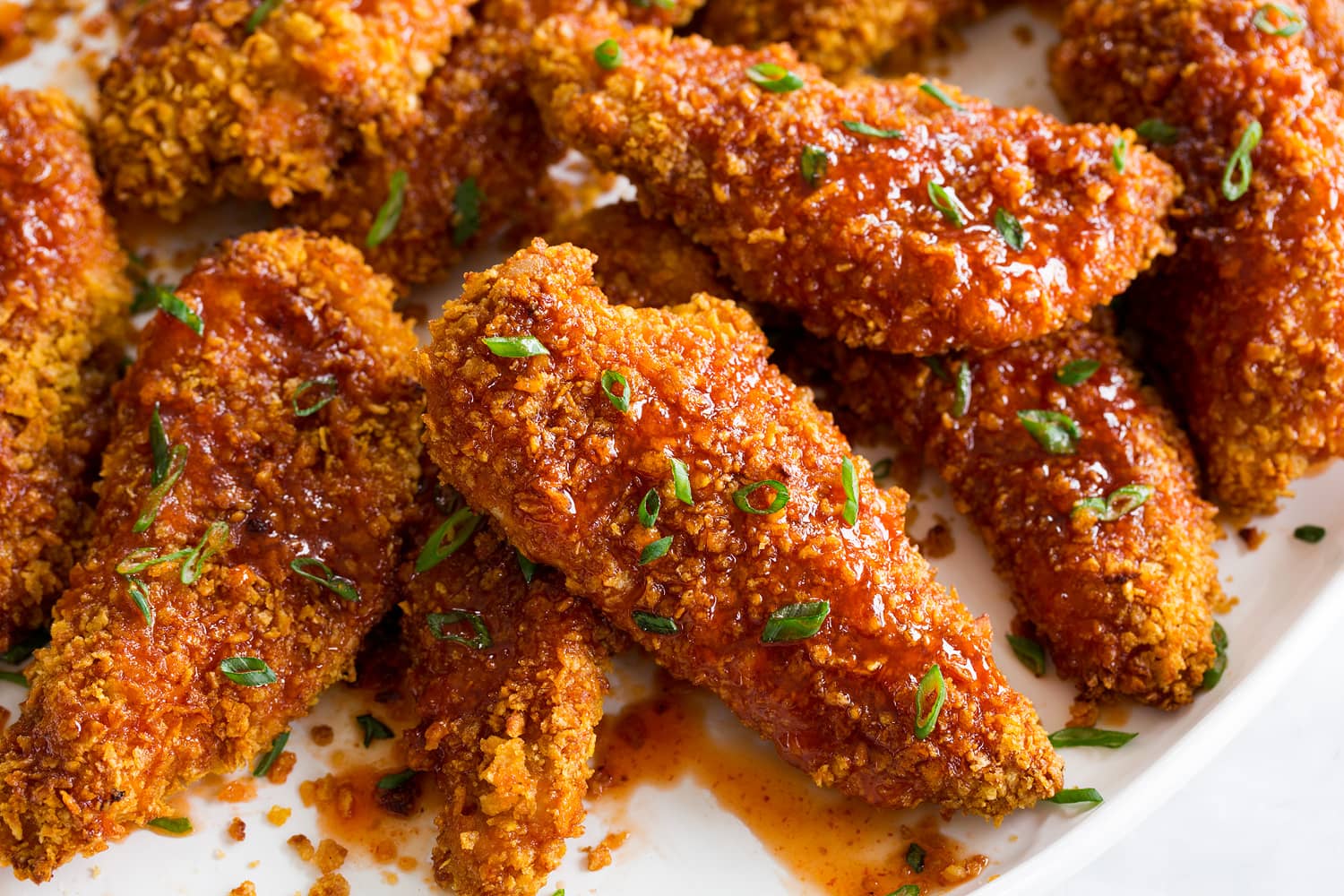 Hot Honey Chicken Chicken strips with added hot honey sauce.