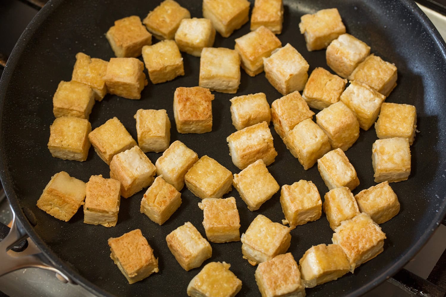 Skillet fried crispy tofu.