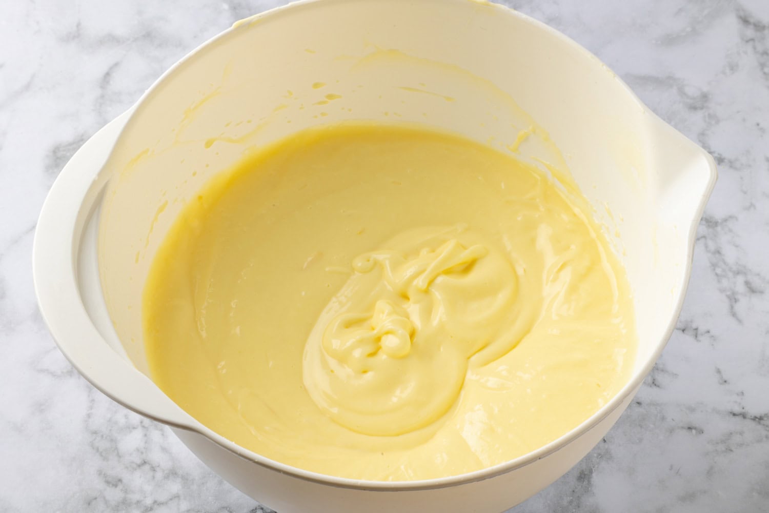 Lemon Icebox Pie Completed lemon pie filling in mixing bowl.