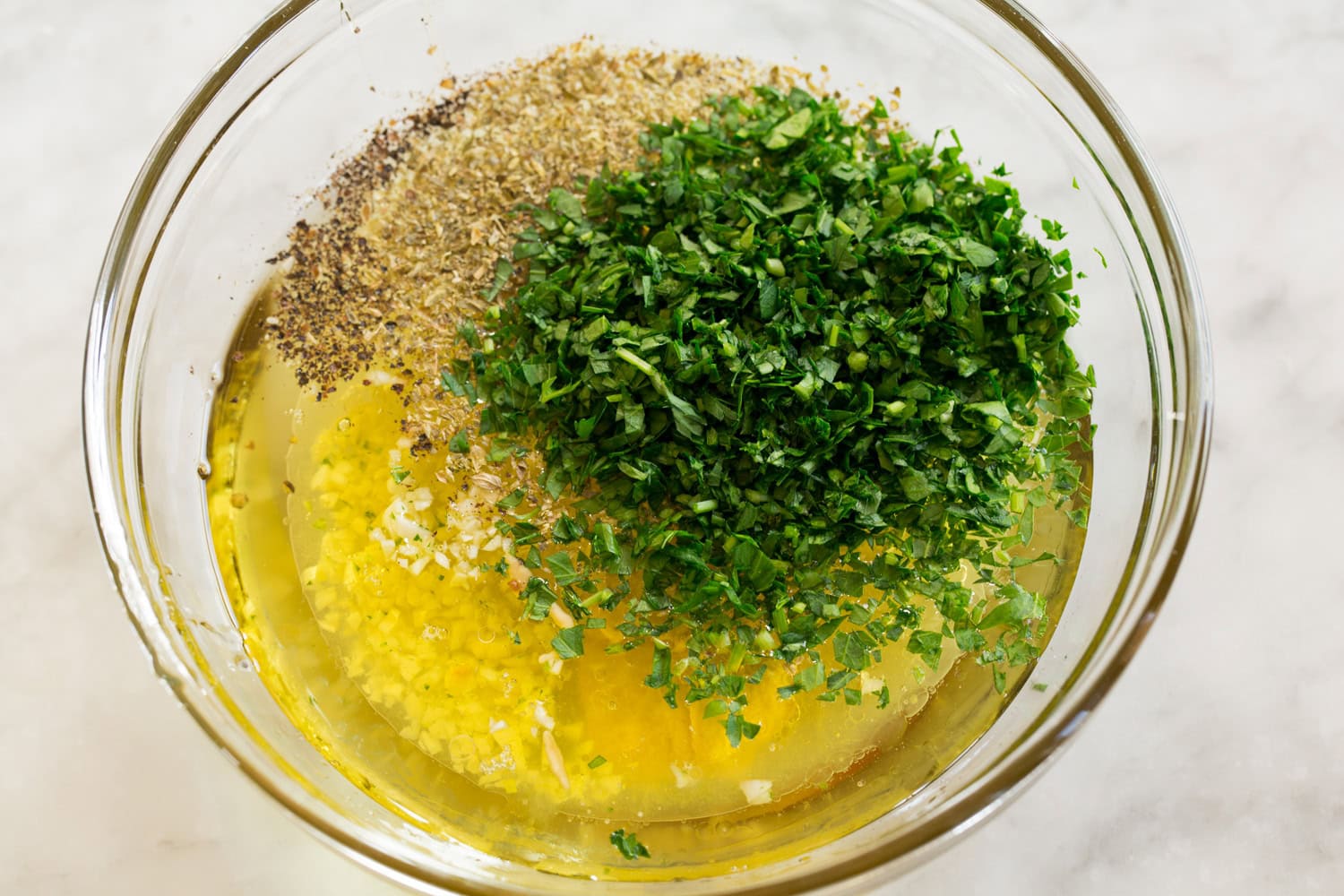 Grilled Chicken Salad Marinade for chicken shown before mixing ingredients.