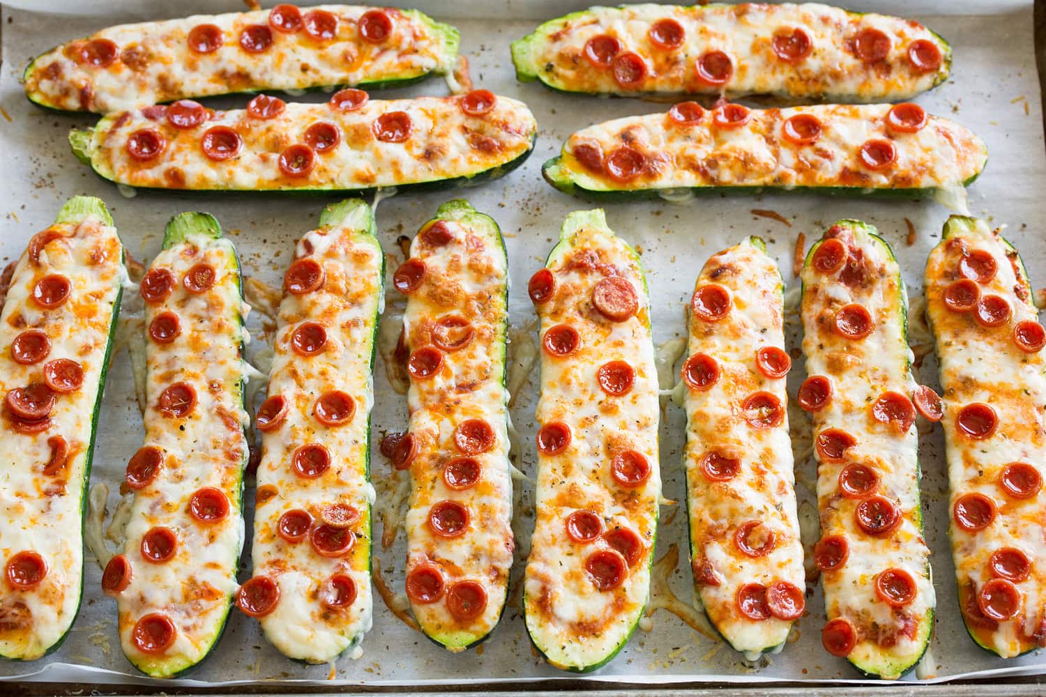 Zucchini Pizza Boats Completed zucchini pizza boats shown after baking through and completed.