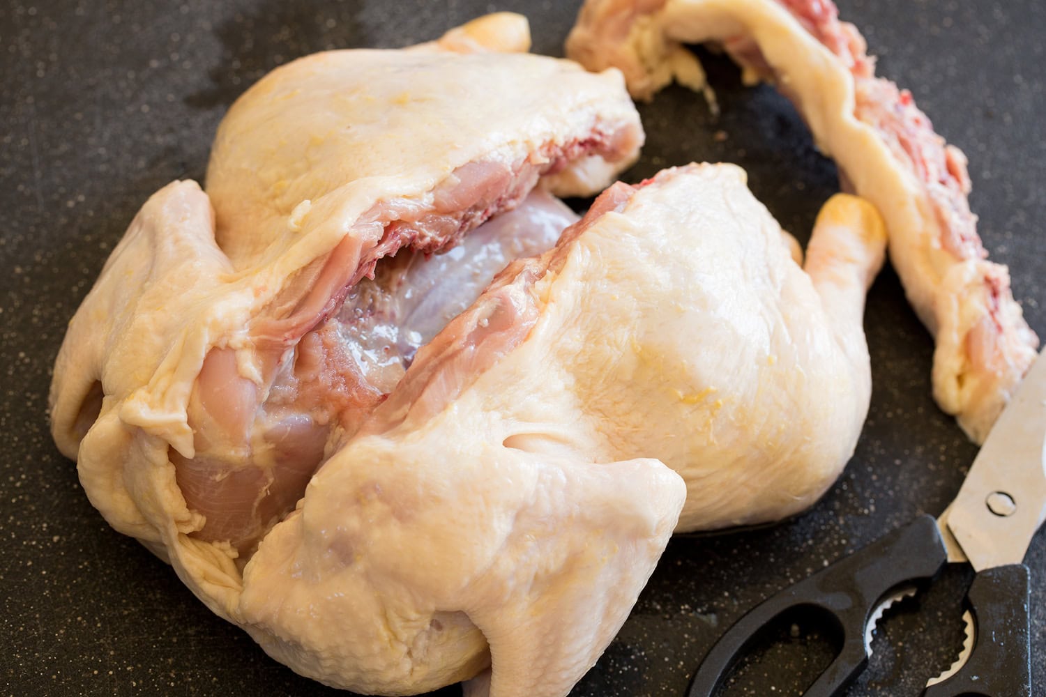 Spatchcock Chicken Whole chicken with spine cut out.