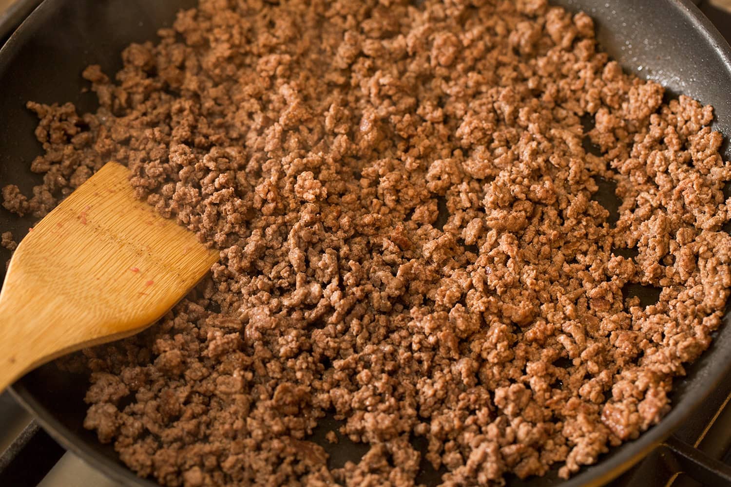 browned beef in a skillet