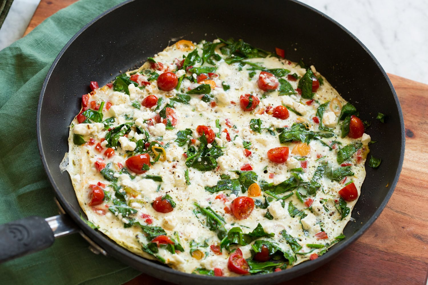 Egg White Omelette Egg white omelette shown in skillet after cooking through.