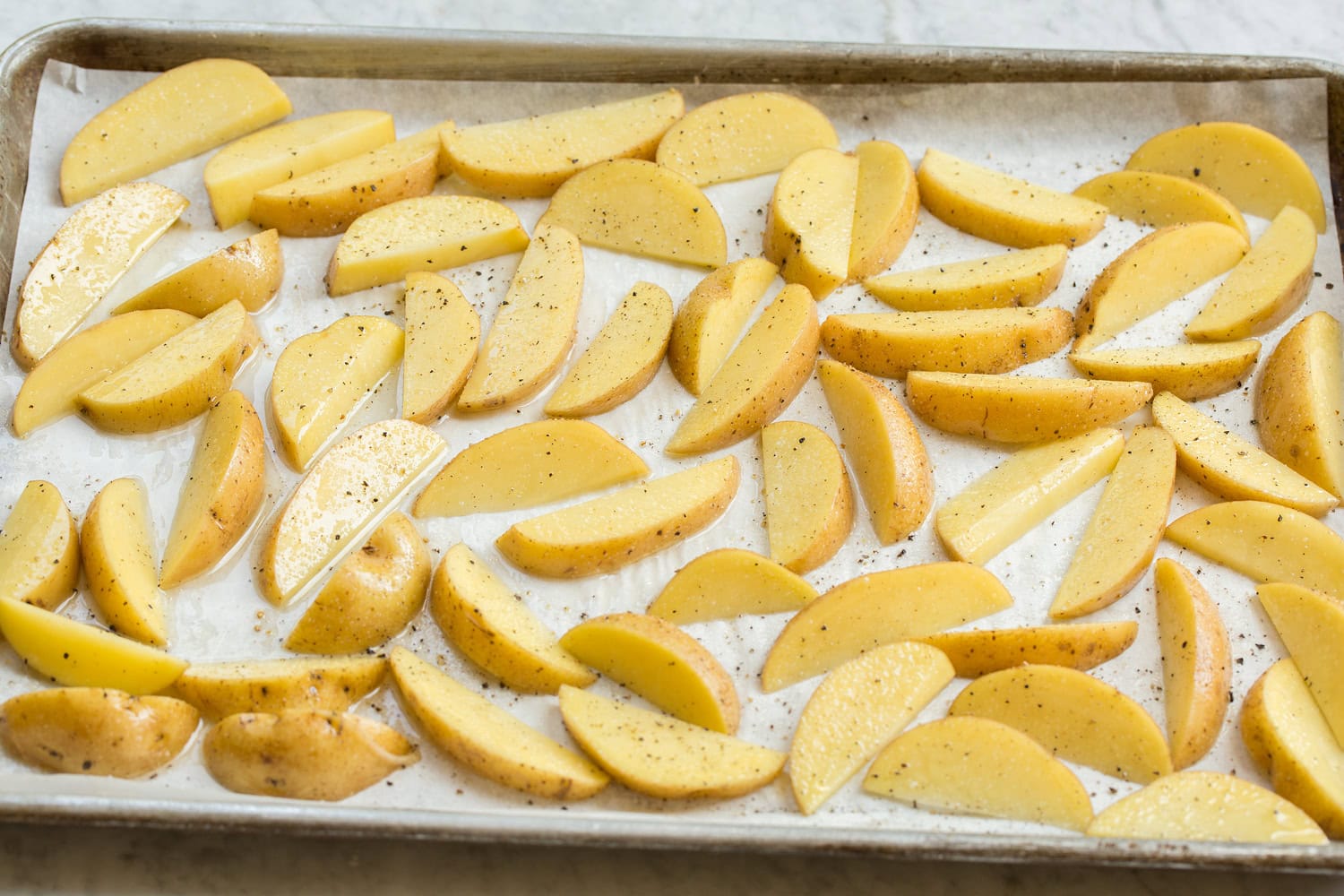 Burger Bowls Oven fries shown before baking.