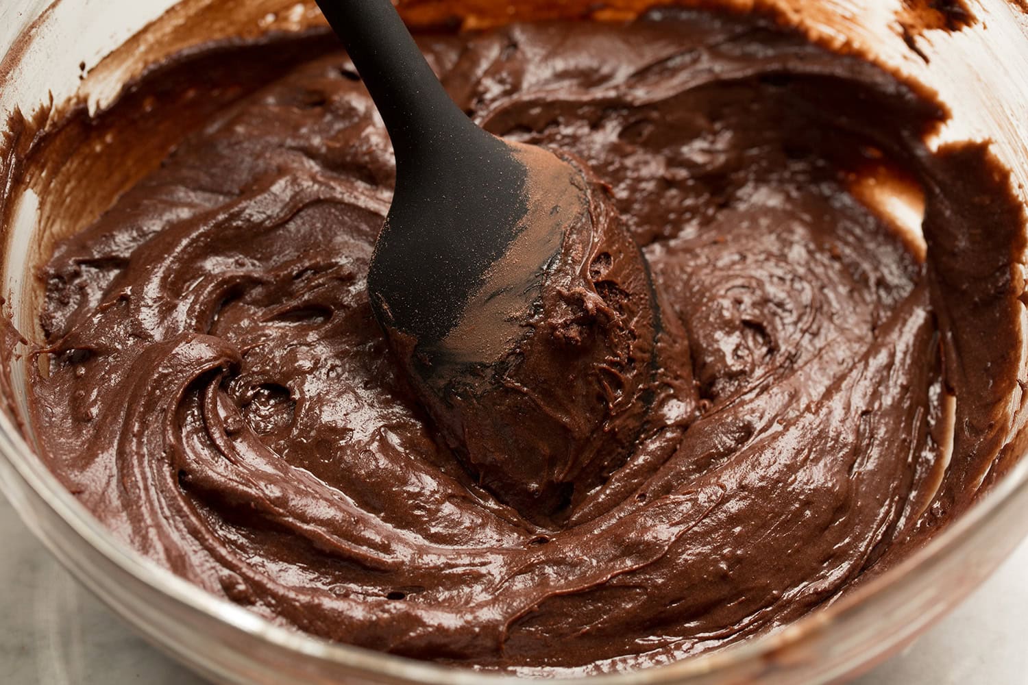 Completed peppermint brownie batter in a mixing bowl.