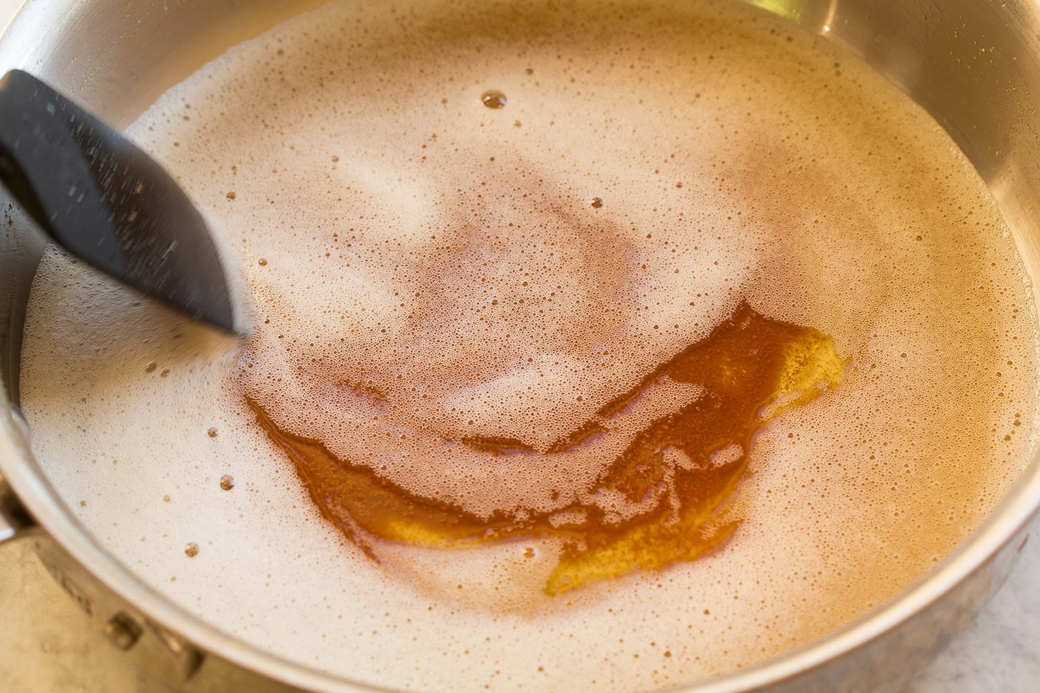 Browned butter in a saute pan.