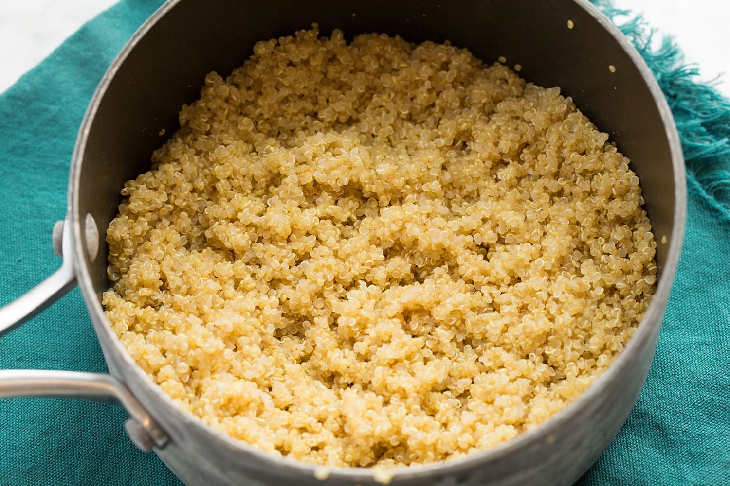Chicken Protein Bowl Quinoa shown cooked in a small saucepan.